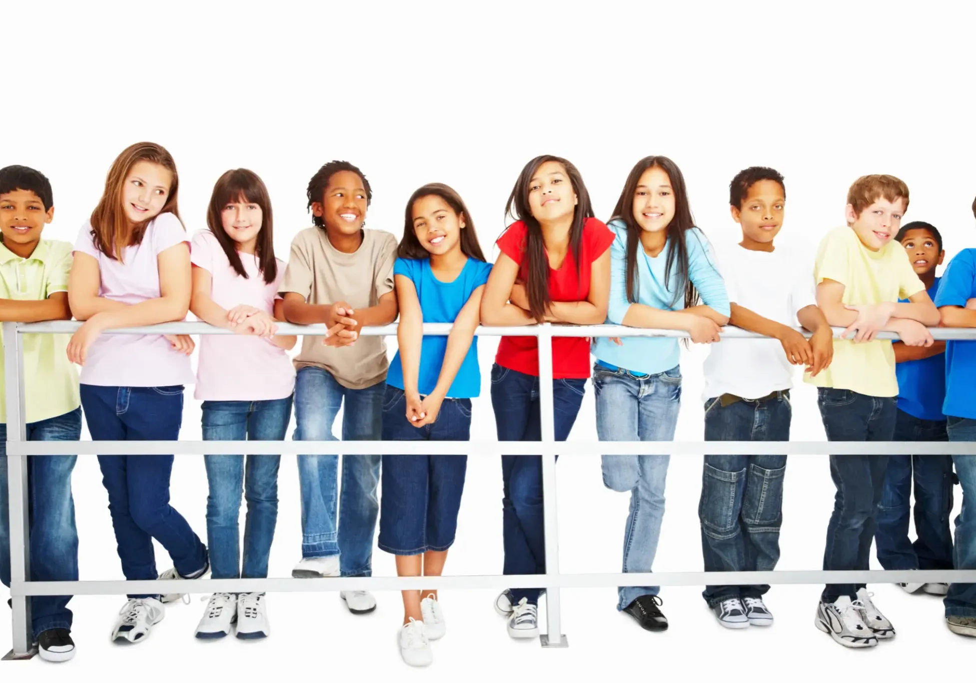 A diverse group of young people standing together, smiling.